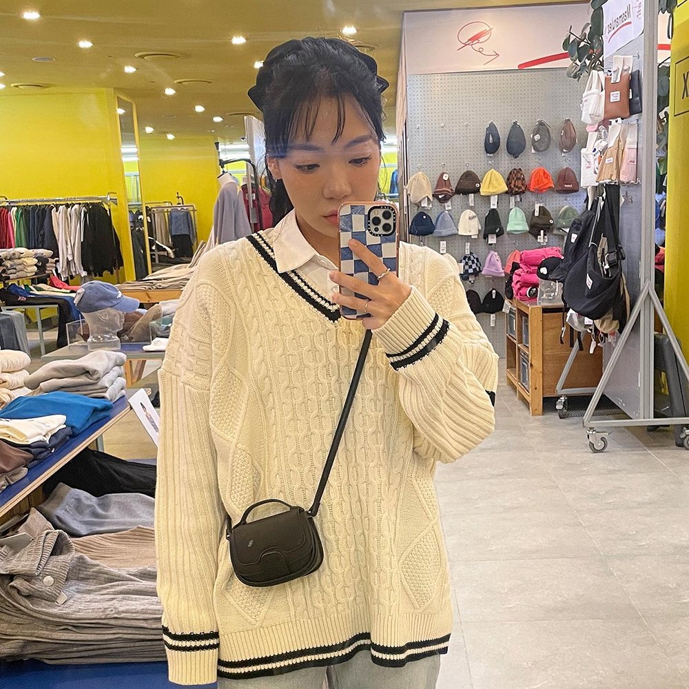 [@__peanutgirl] BEI Saddle Micro Mini Bag (Black) | Karim Rashid